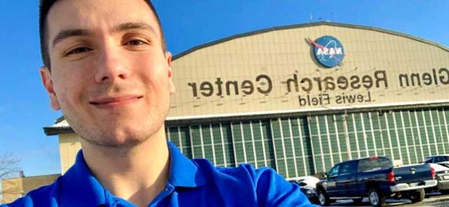 An Akron engineering student outside of NASA Cleveland, where he is interning